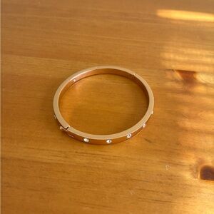Kate spade set in stone hinged bangle in rose gold